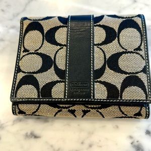 Coach canvas and leather wallet. Brown and tan Coach fabric w/brown leather